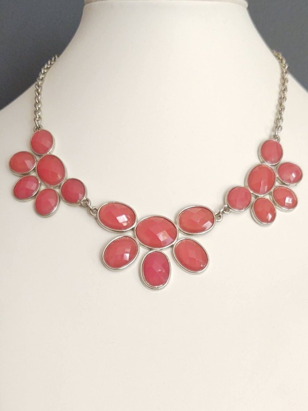 Silver necklace with grapefruit colored beads